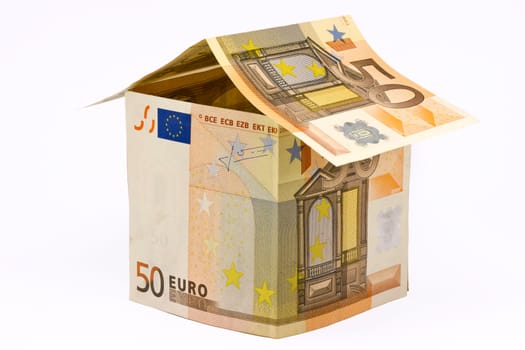 house made of euro money bills isolated on white background