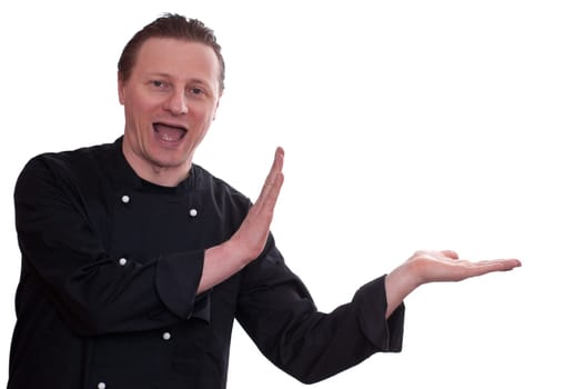 A man as a cook is funny laughing and holding something with his hands