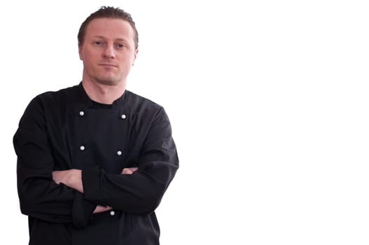 A man as a cook looks into the camera