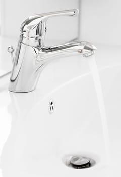Water running close up in the bathroom