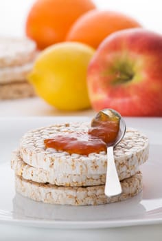 Healthy rice cake with bio jam close up