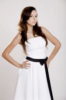 Beautiful and sexy woman wearing a wonderful white dress