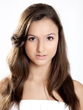 Close-up portrait of a beautiful teenage girl smilling