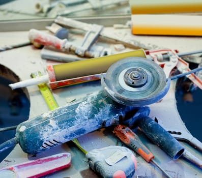 home improvement repair messy clutter with dusted tools handtools