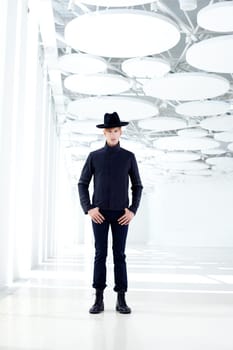 black far west modern fashion man with hat in modern indoor