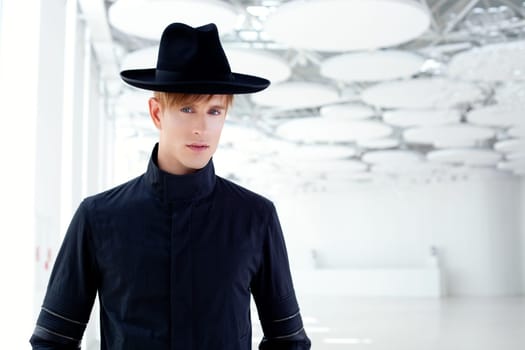 black far west modern fashion man with hat in modern indoor