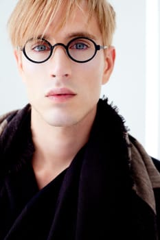 blond modern handsome student man with nerd glasses portrait