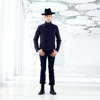 black far west modern fashion man with hat in modern indoor