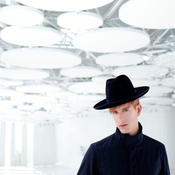 black far west modern fashion man with hat in modern indoor