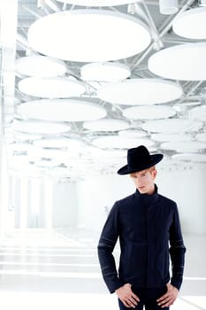 black far west modern fashion man with hat in modern indoor