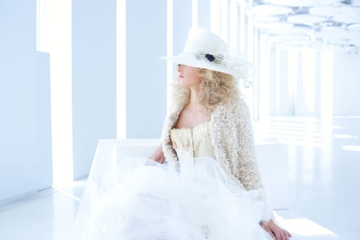 blond fashion woman with eighteenth century corset haute couture