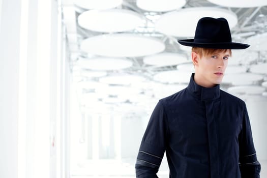 black far west modern fashion man with hat in modern indoor