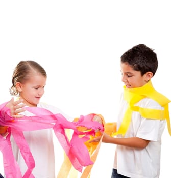 two children kids in a party with messy colorful paper ribbon
