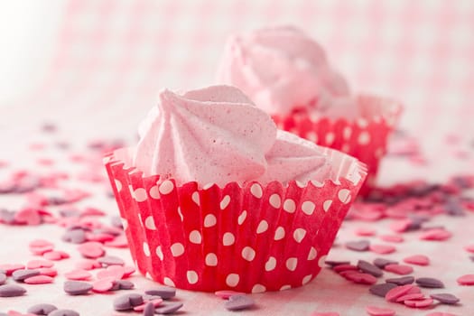 Close-up of delicious pink meringue. Studio shot.