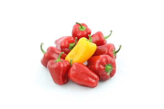 details of a red and yellow bell pepper isolated on white