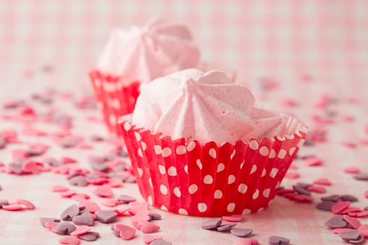 Close-up of delicious pink meringue. Studio shot.