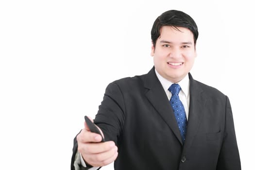 Handsome young man in a suit giving you a mobile