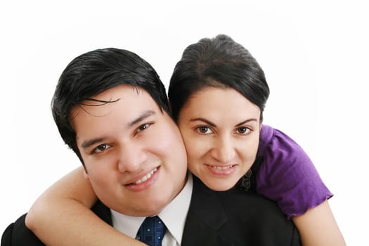 Portrait of a beautiful young happy smiling couple - isolated