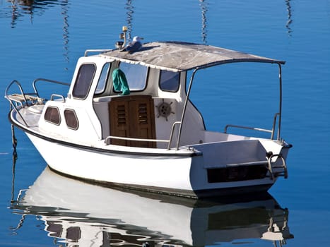fishing boat anchored in the port