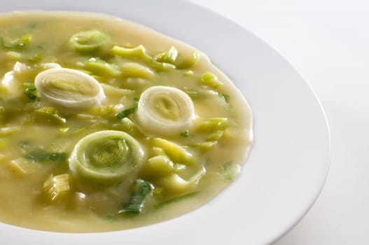 Fresh green leek soup close up shoot