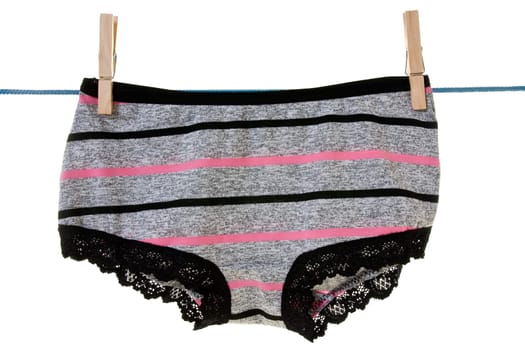 panties hung on the clothes line. isolated on white background