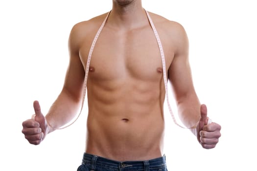 Fit man giving thumbs up on white