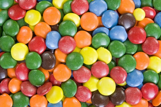 Background image of sweet smarties or chocolate buttons