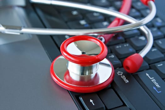 Stethoscope on the computer keyboard
