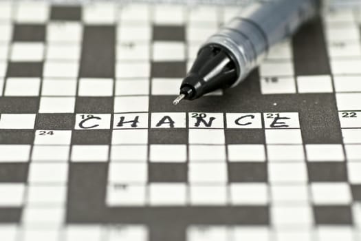 a shot of crossword with word "chance"""