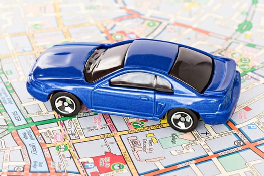 tourism concept. small blue car on Dublin city map