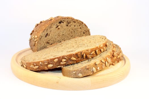Bread with sunflower seeds isolated on white background