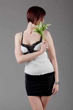 attractive smiling woman. Portrait of an attractive young woman.  lady posing on grey background.