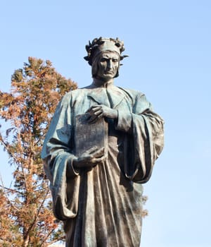 Statue of Dante holding Commedia book in Meridian Hill Park in Washington DC