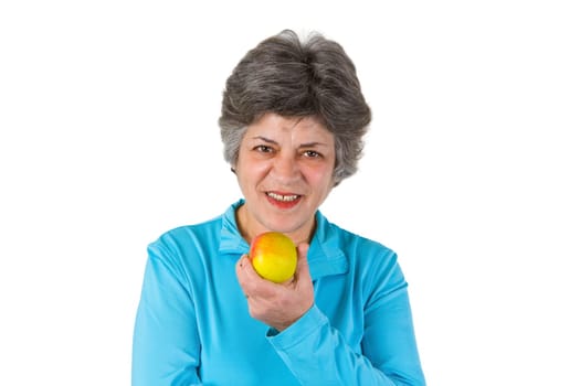Senior woman eating apple - isolated on white background