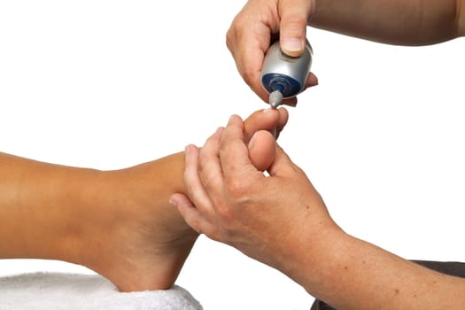 Pedicure on white background