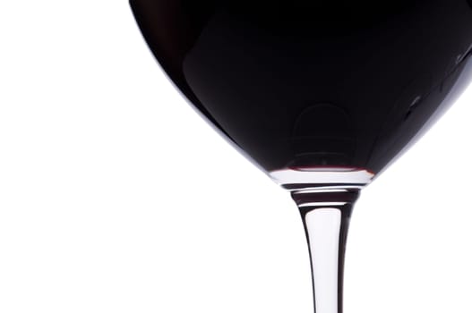 Close-up in backlight of a red wine in a wine glass