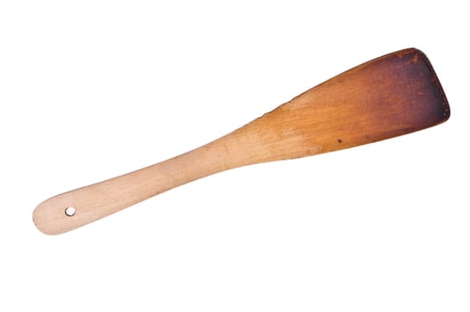 A used old wooden spoon for cooking