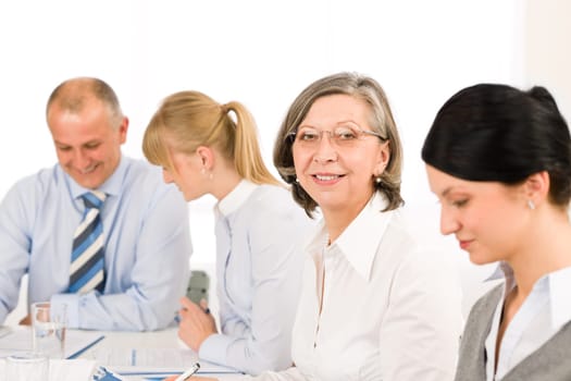 Business team meeting executive senior businesswoman with colleagues