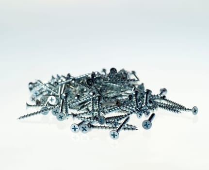 Stack of screws isolated on white background