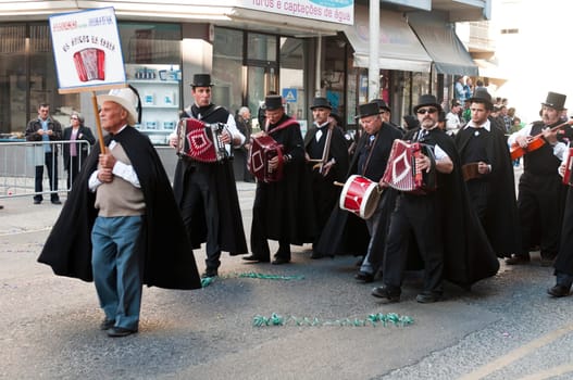OUREM, PORTUGAL - FEBRUARY 19: unidentified people perform at the Carnival Parade on February 19, 2012 in Ourem, Portugal. The traditional yearly Parede was held during the afternoon.