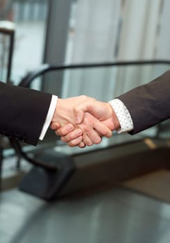 Close-up of a handshake with selective focus
