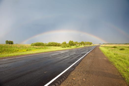 Road to the rainbow. After thunderstorm, Novosibirsk area, June 2007