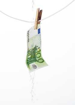 Laundering money towards white background