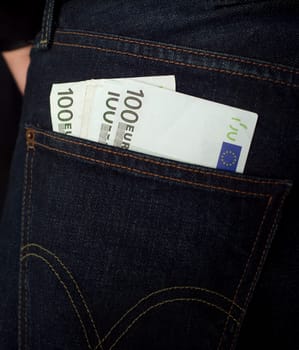 100 Euro Bank notes in a jeans pocket