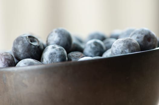 Close up of Blueberries in a bowl.