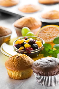 Freshly baked muffins with fruit close up shoot