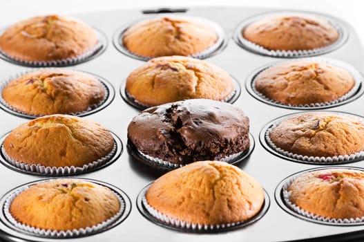 Freshly baked tasty muffins close up shoot