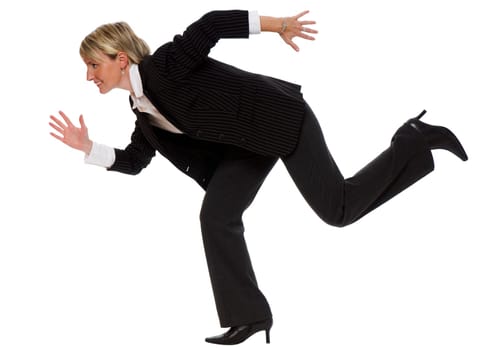 young blond business woman running, isolated on white