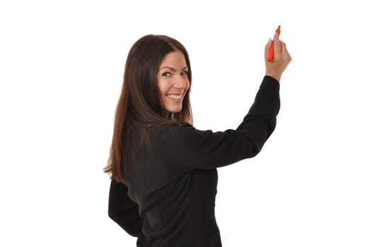 Attractive businesswoman turning around while writing