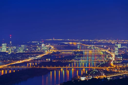 Vienna at night with Danube,panorama taken from Leopoldsberg